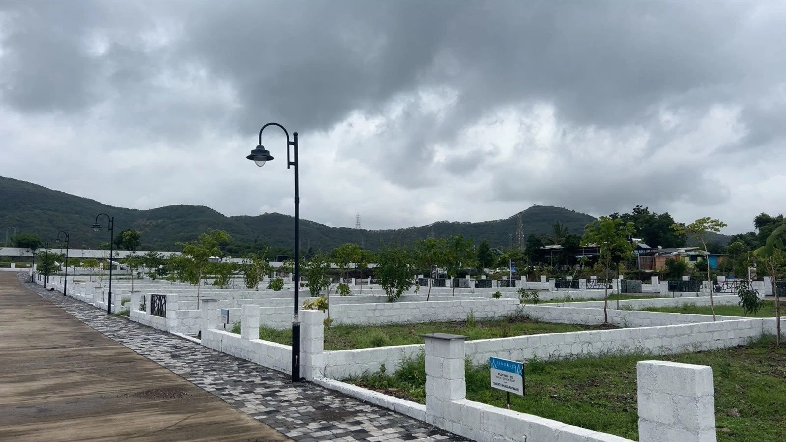 Vouge Estate — developed plots with hill backdrop